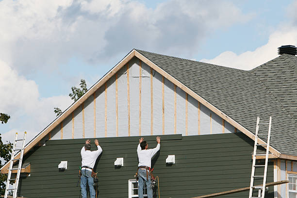 Professional Siding Contractor technician working in Lynn, MA